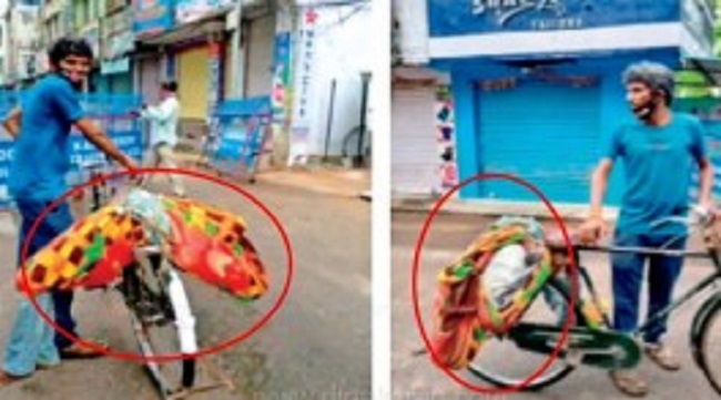 சடலத்தை துணியில் சுற்றி சைக்கிளில் எடுத்துச் சென்ற நபர்! கொரோனாவால் நடக்கும் துயரம்