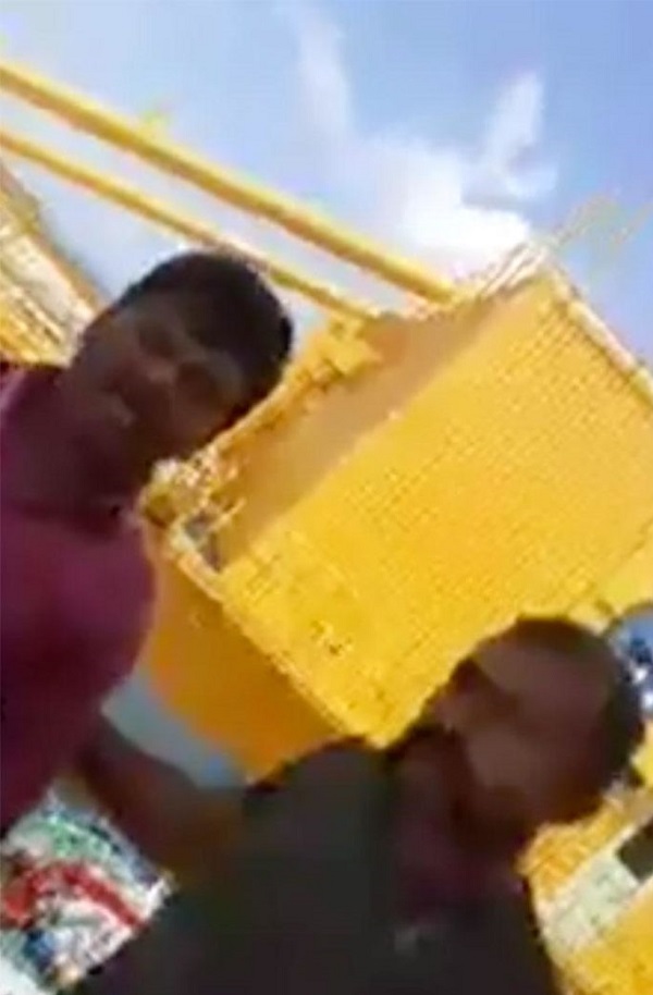 பளுதூக்கியின் மேல் ஏறி கவனயீர்ப்பு போராட்டத்தில் ஈடுபட்ட ஊழியர்கள்!