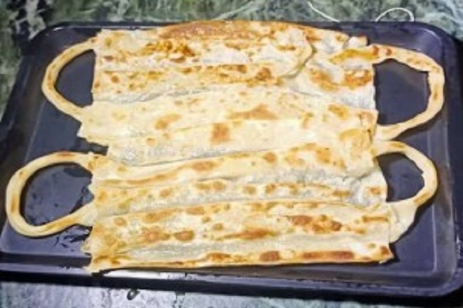 பரோட்டாவில் முககவசம் செய்து அசத்தும் உணவகம்.. அலைமோதும் மக்கள்..