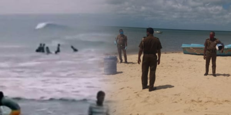 கடலில் மூழ்கிய  இளைஞனை காப்பற்றிய பொலிசார்!