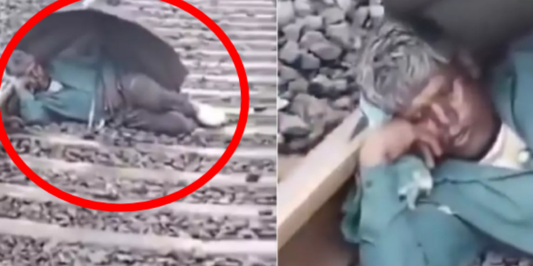 தண்டவாளத்தில் தலை வைத்து படுத்து உறங்கும் நபர்!